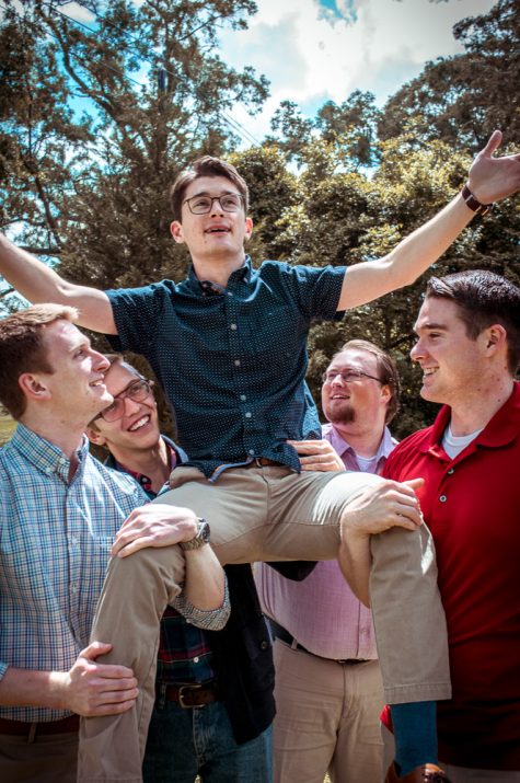 Wedding Shower Groomsmen Holding Groom