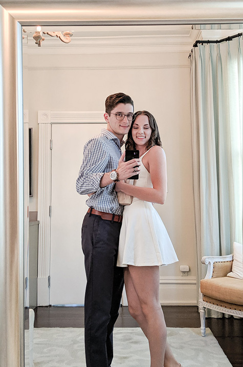 one-year anniversary hugging mirror selfie