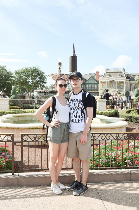 Magic Kingdom Trip_Alex and Cait in front of fountain